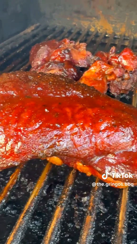 BBQ pork ribs cooking on the grill